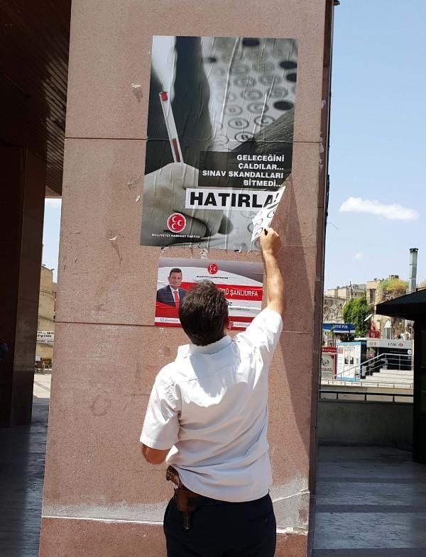 Erdoğan'ın gelişinden önce MHP afişleri söküldü