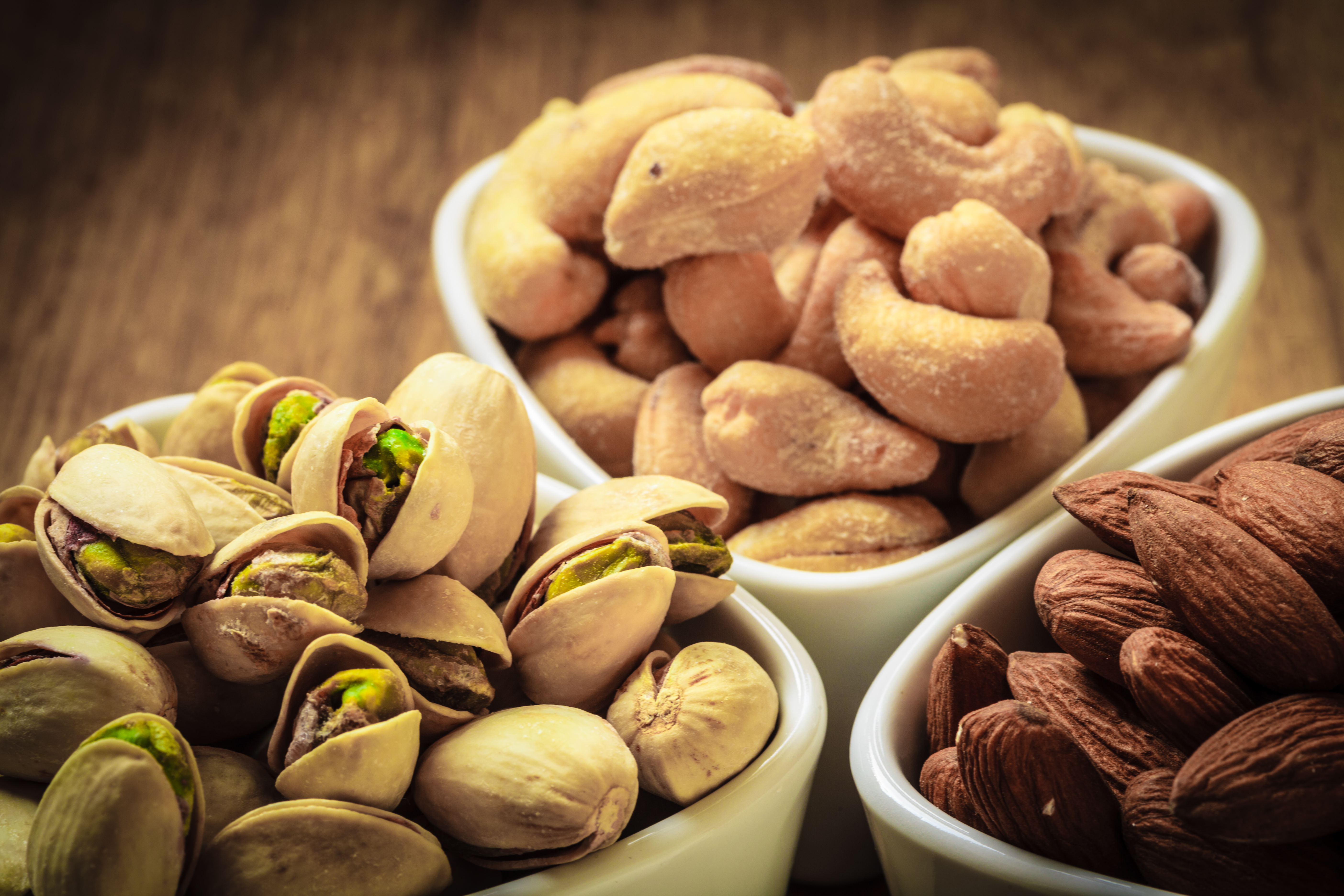 Healthy food and cuisine. Varieties of nuts: cashew, pistachio, almond