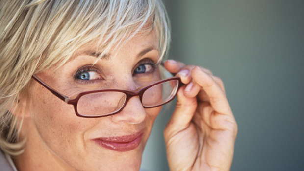 Portrait of mature woman looking over spectacles,close-up